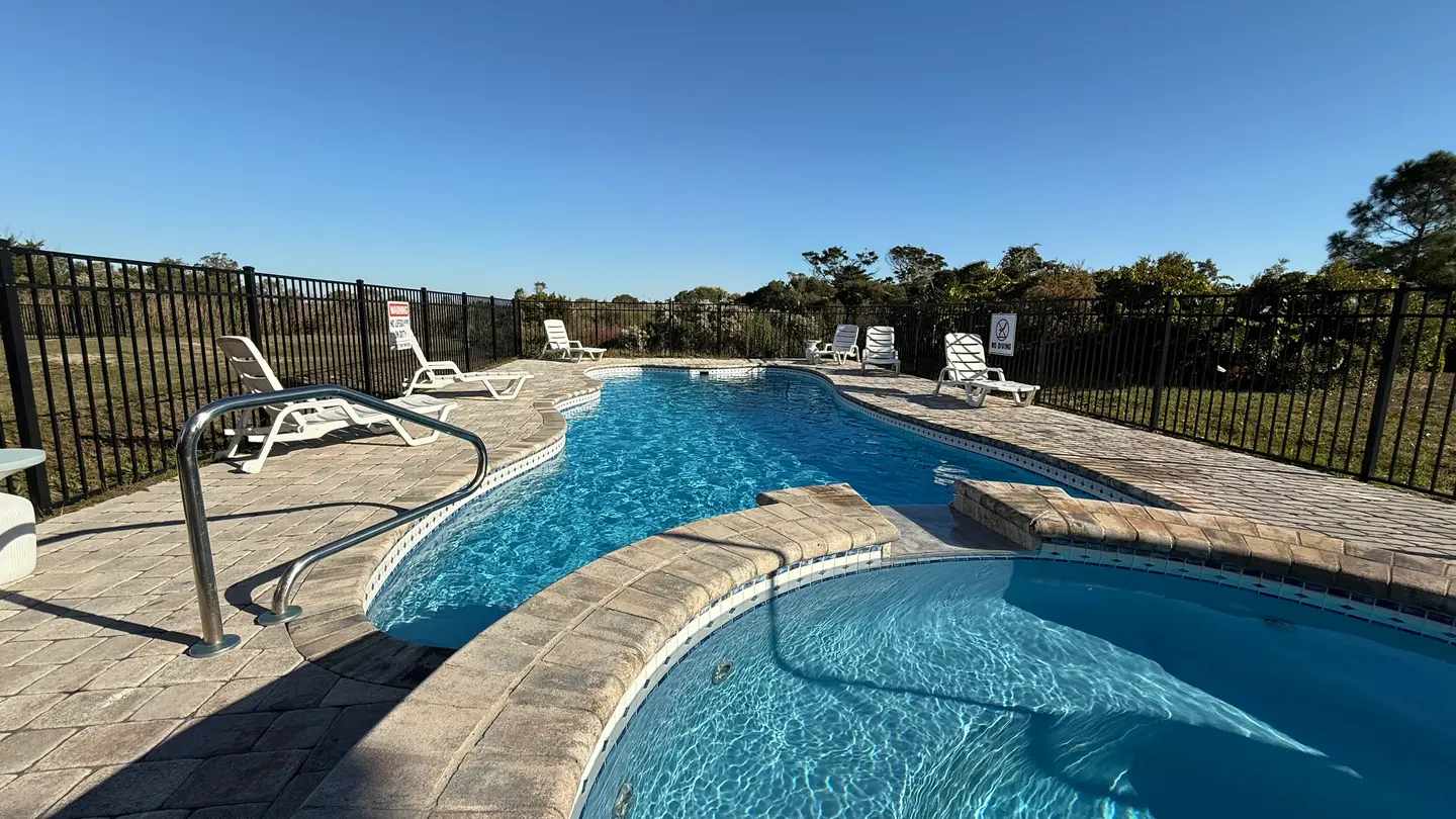 Beautiful pool and spa at Oak Island vacation rental